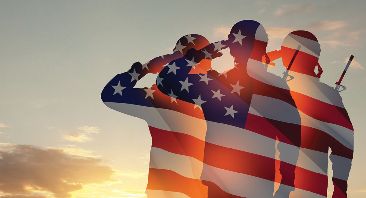 three soldiers salute